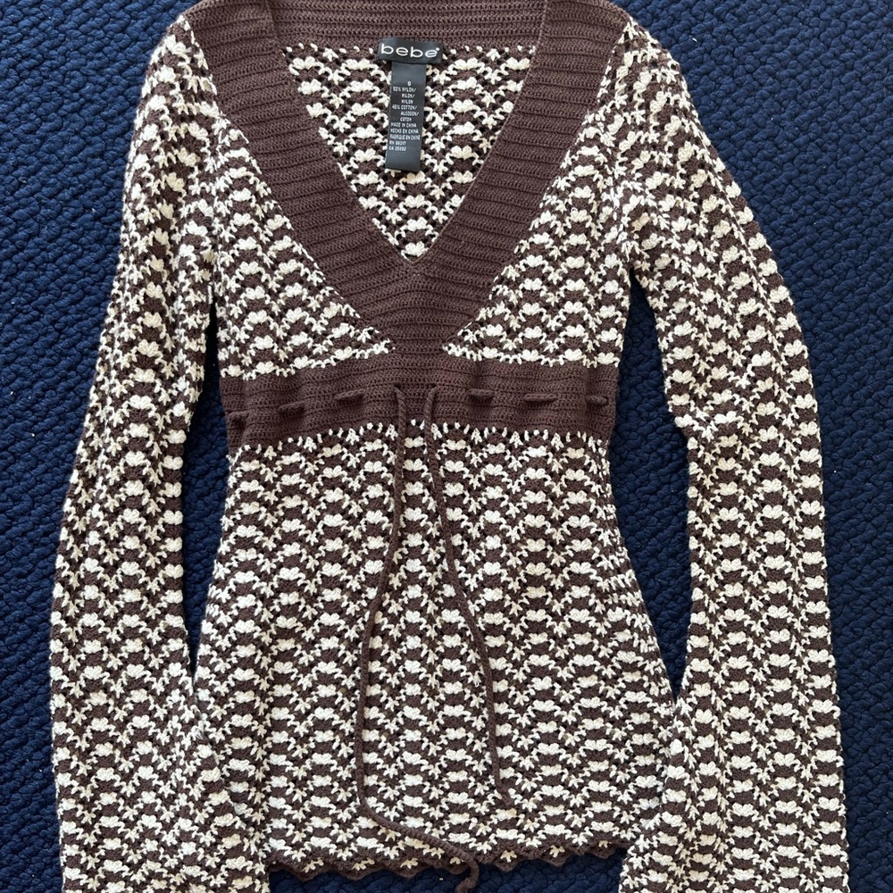 BEBE top knitted . New no tag,